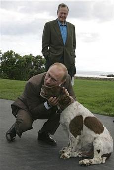 Putin nuzzles dog
